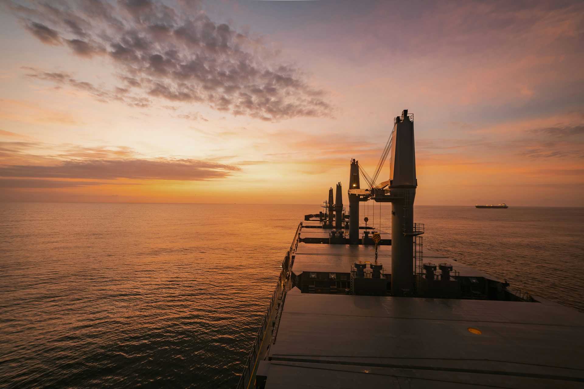 Offshore oil platform at sunset